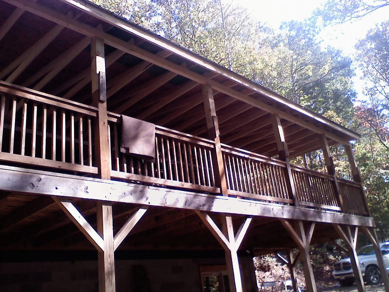 Timber framing under a new elevated porch and deck — Roof Leak Repair in Monmouth Junction by Roofing Brothers